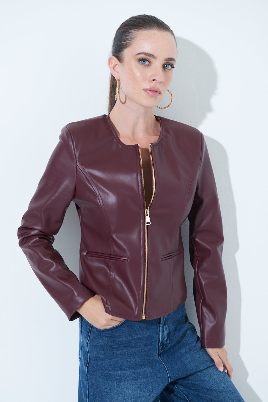 Woman  in Sleek zip-up Burgundy leather jacket