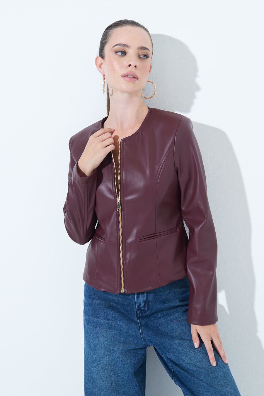 Woman  in Sleek zip-up Burgundy leather jacket