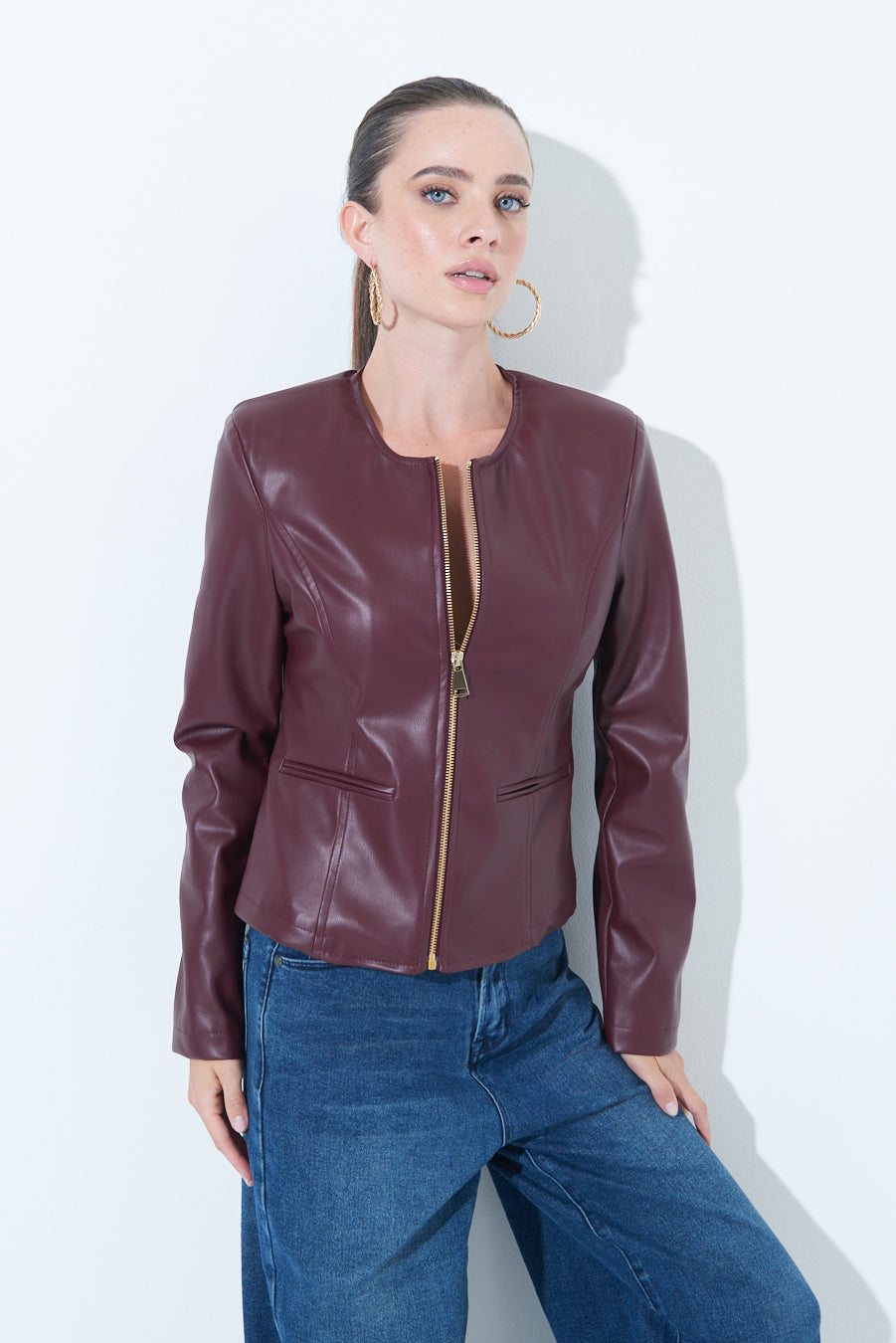 Woman  in Sleek zip-up Burgundy leather jacket