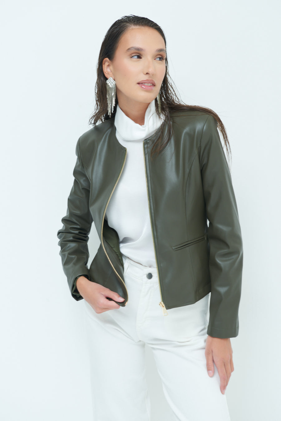 Woman  in Sleek zip-up green leather jacket
